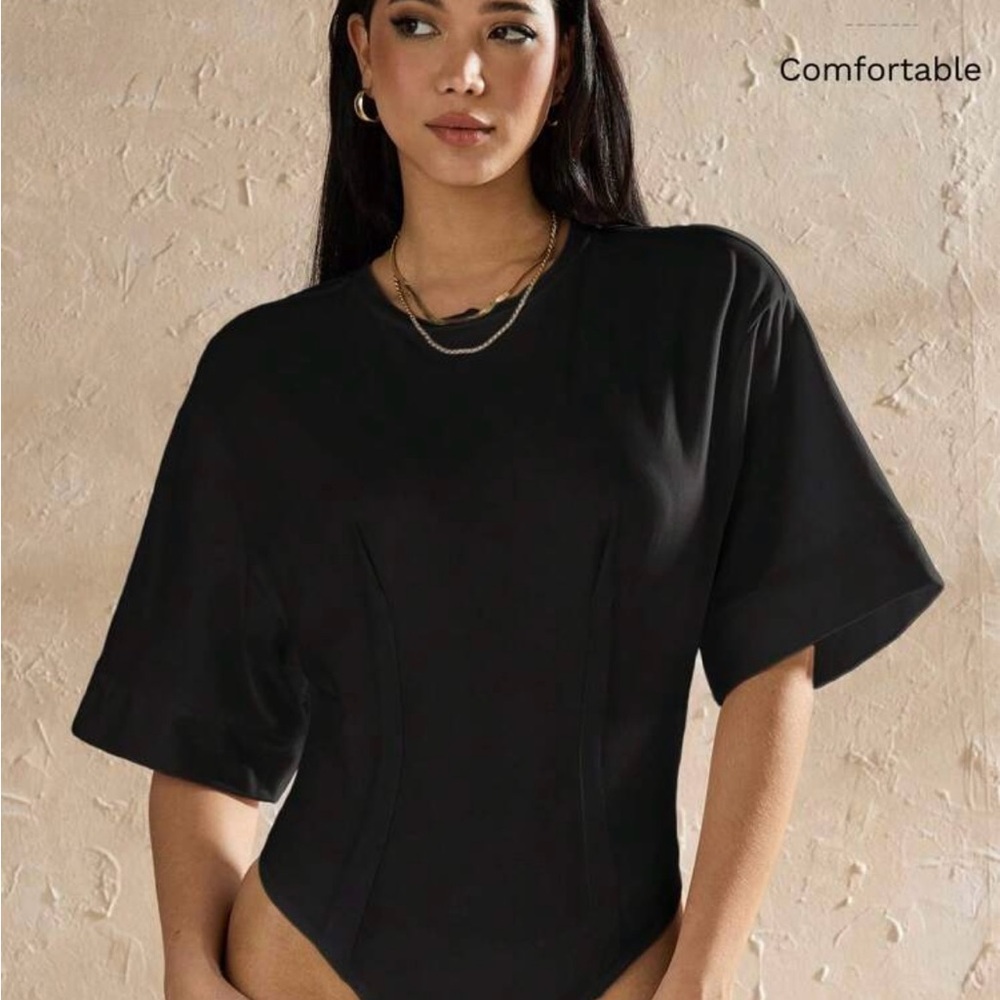 Women’s black body suit